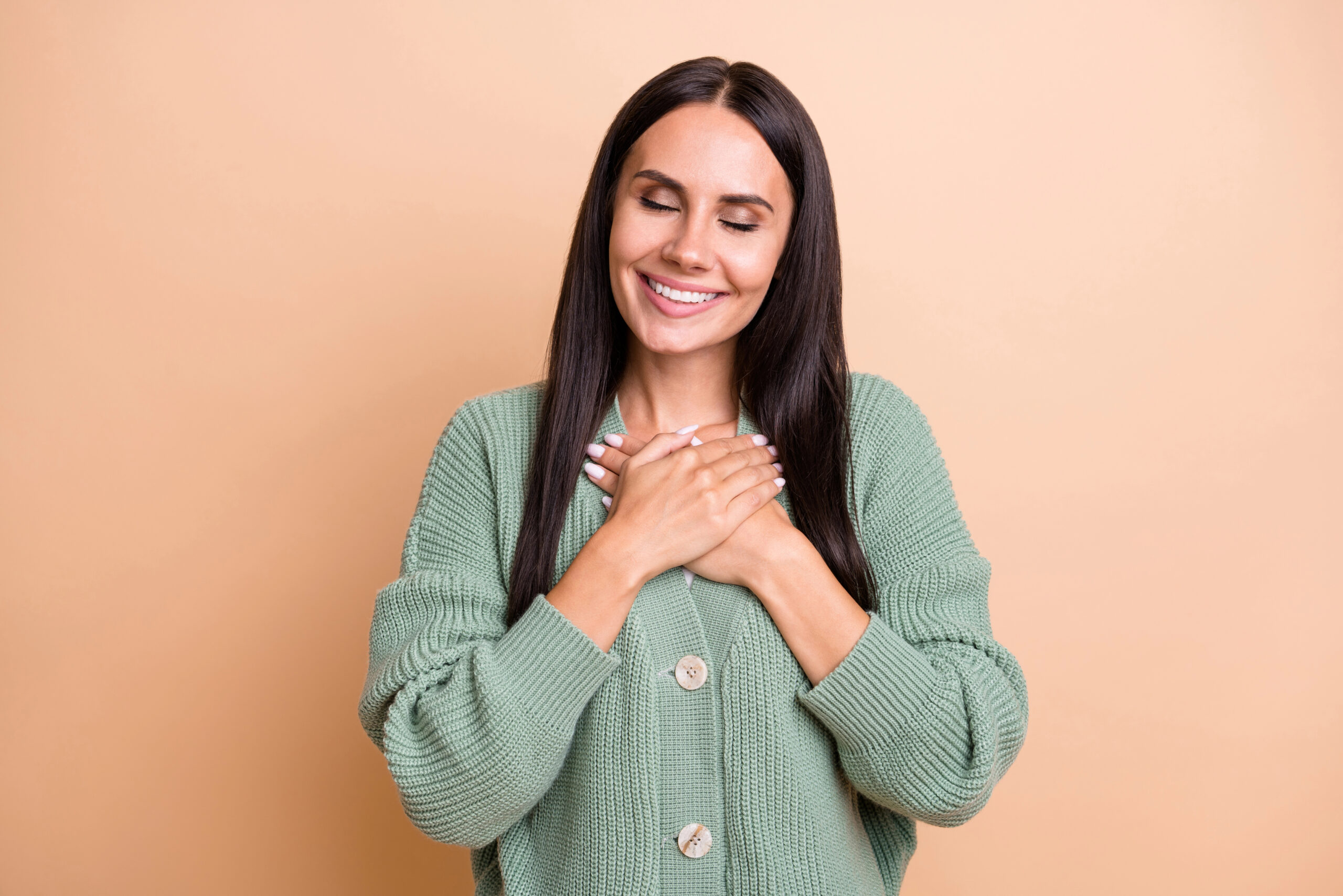 Meditating with hands on heart